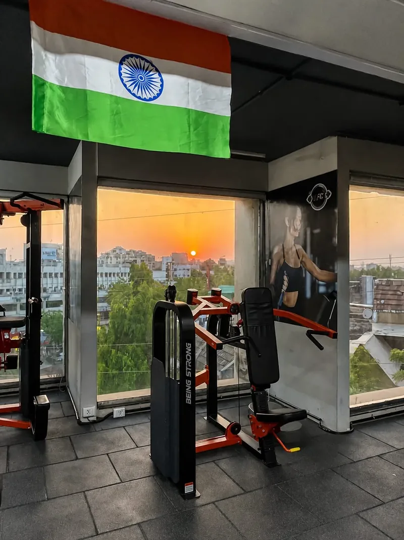 Machines by the window at sunset